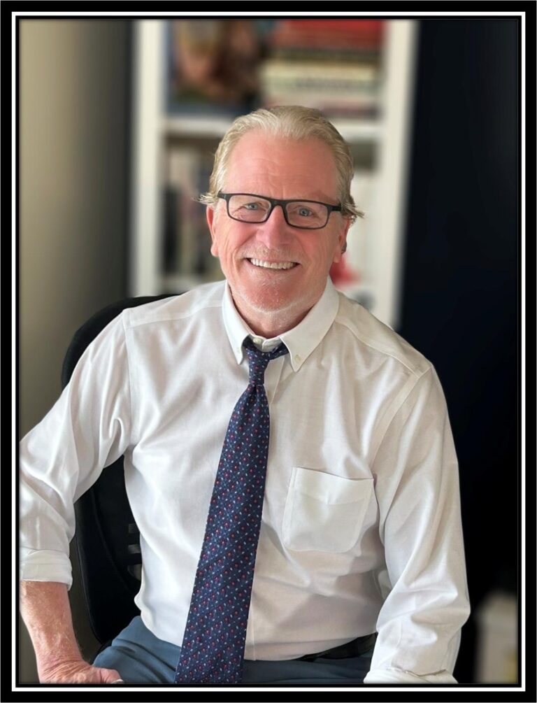 head shot lower res 768x1005